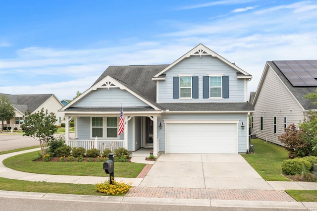 1433 Beaumont Way, Myrtle Beach, SC 29577 - view of front facade featuring a porch, an attached garage, a front lawn, driveway, and a shingled roof