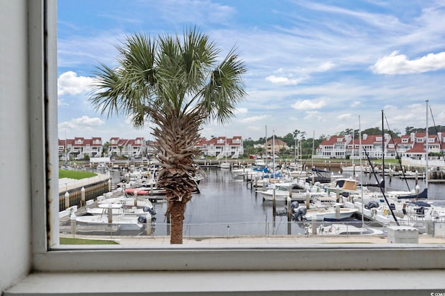 property view of water featuring a boat dock