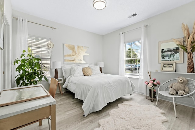 bedroom featuring light hardwood / wood-style floors