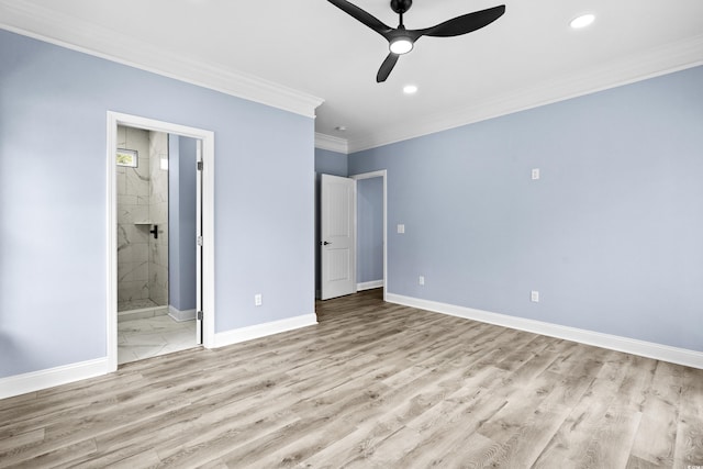 unfurnished bedroom featuring light wood-type flooring, ensuite bathroom, ceiling fan, and crown molding