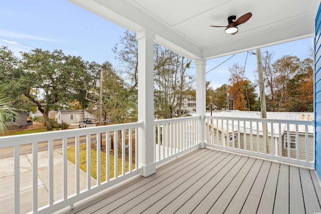 wooden terrace with ceiling fan