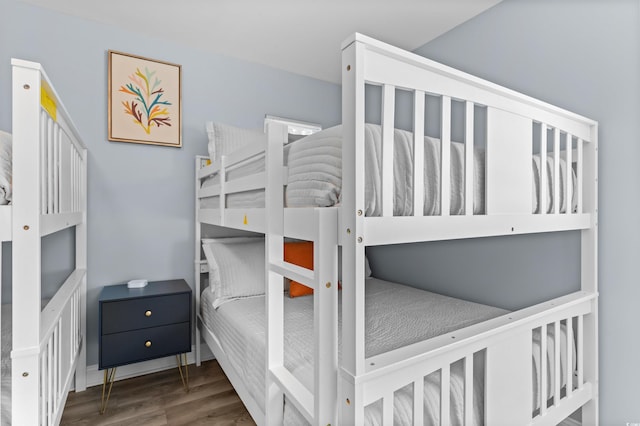 bedroom with wood finished floors