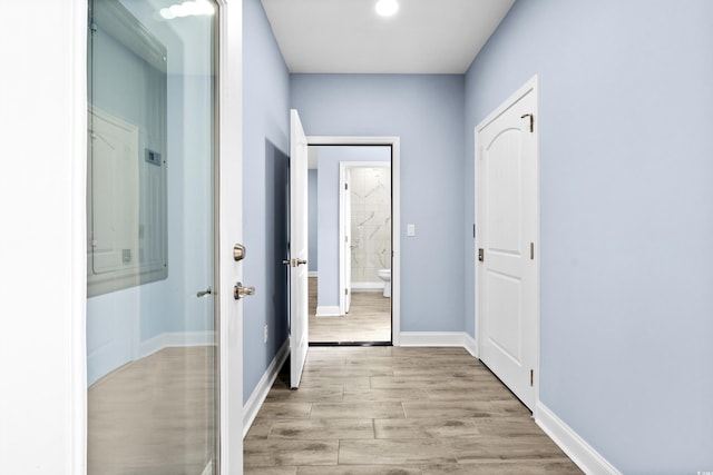 hall featuring light hardwood / wood-style flooring