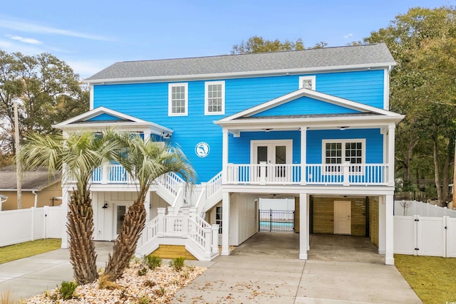 beach home featuring a carport and a porch