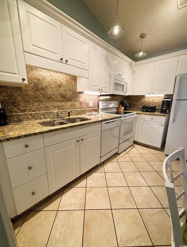 kitchen featuring backsplash, hanging light fixtures, white appliances, and white cabinets