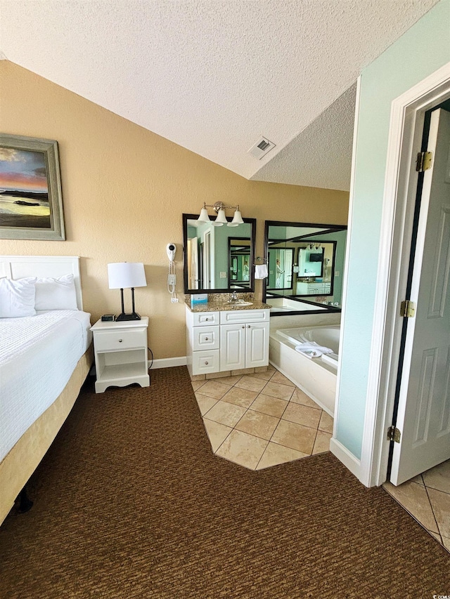 unfurnished bedroom with light carpet and a textured ceiling