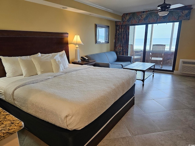 tiled bedroom with access to outside, ceiling fan, a water view, and a wall mounted air conditioner