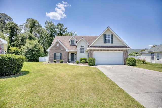 view of front of property with a garage and a front lawn