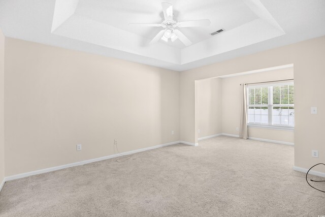 2513 Hunters Trl, Myrtle Beach, SC 29588 - carpeted empty room with a raised ceiling, a ceiling fan, and baseboards