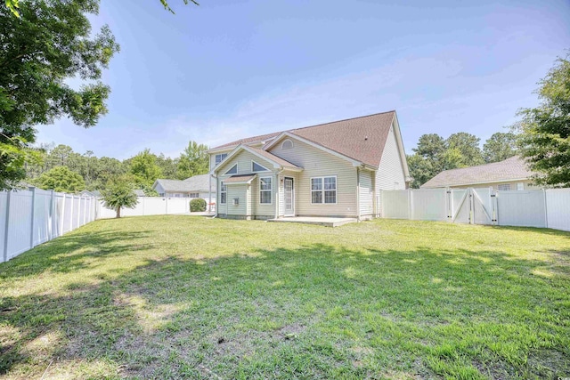 view of front of house featuring a patio area and a front yard