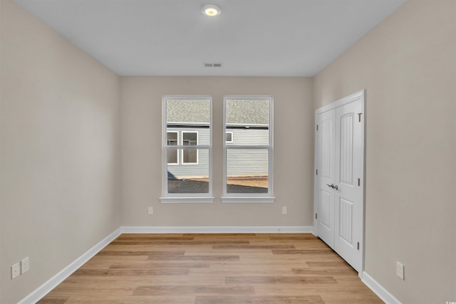 empty room featuring light hardwood / wood-style flooring