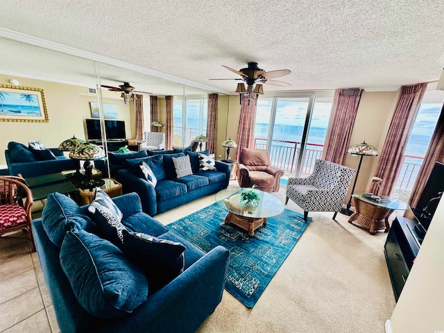 living room featuring carpet, ceiling fan, a textured ceiling, and a water view