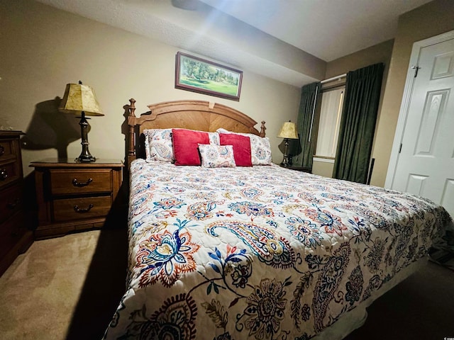 bedroom featuring carpet