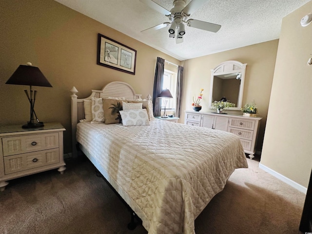 carpeted bedroom with a textured ceiling and ceiling fan