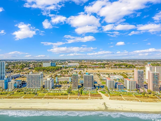 bird's eye view featuring a beach view and a water view