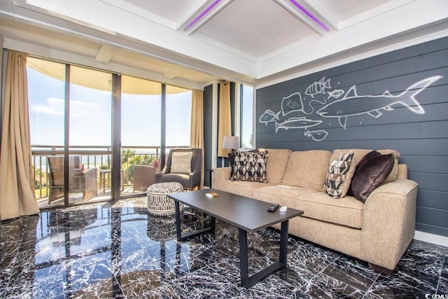 tiled living room with beam ceiling and expansive windows