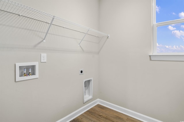 clothes washing area with hookup for an electric dryer, wood-type flooring, and hookup for a washing machine