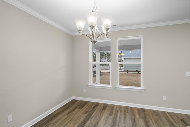 unfurnished dining area with dark hardwood / wood-style flooring, ornamental molding, and a chandelier