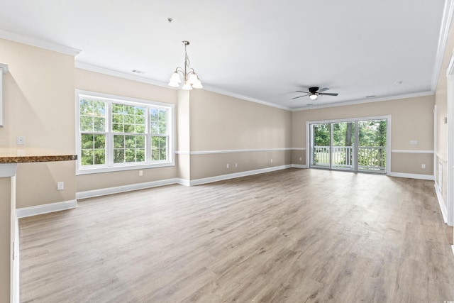 unfurnished living room featuring ceiling fan with notable chandelier, light hardwood / wood-style floors, and ornamental molding