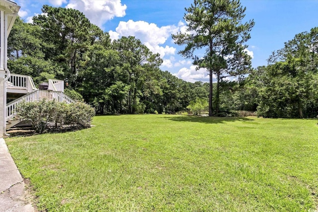 view of yard with a deck