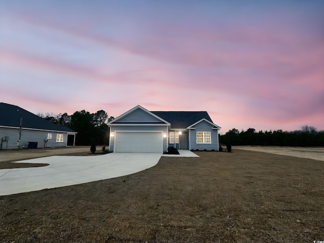 ranch-style home with a garage