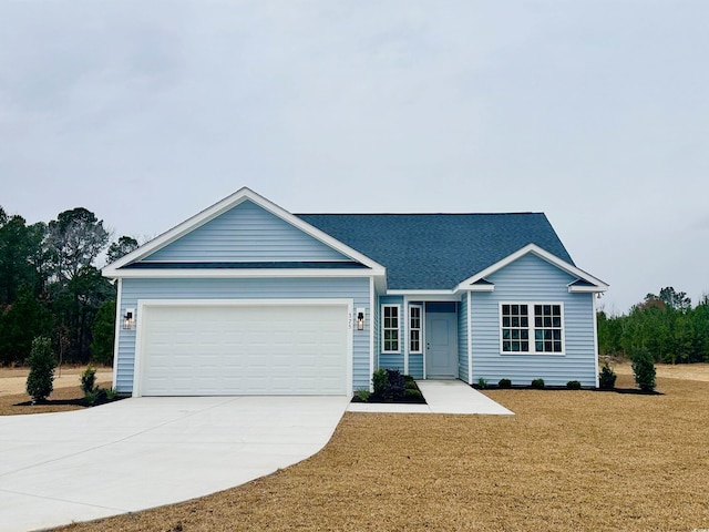 ranch-style home featuring a front lawn and a garage