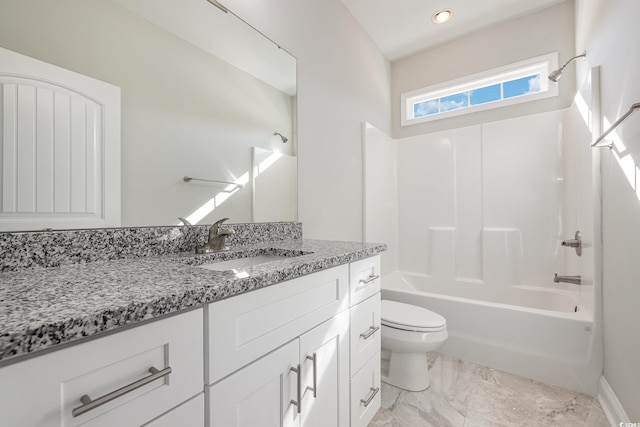 full bathroom featuring shower / tub combination, vanity, and toilet