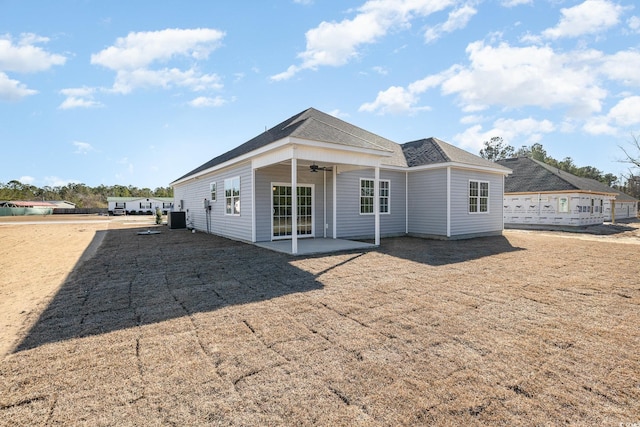 back of house featuring ceiling fan, cooling unit, and a patio area