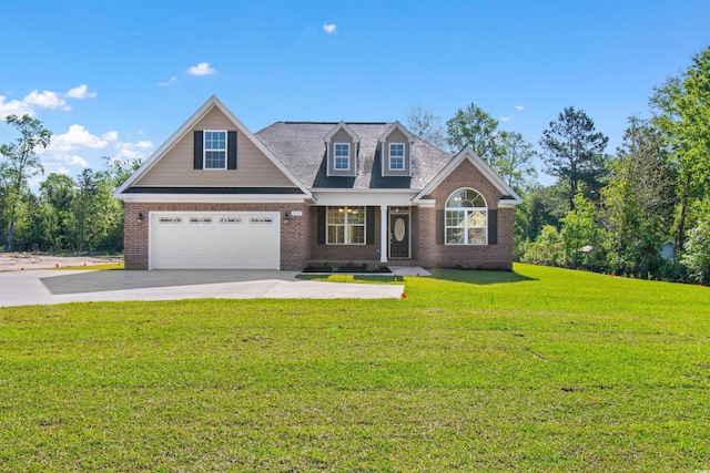 view of front of home featuring a front lawn and a garage