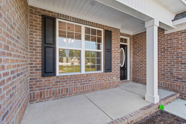 property entrance featuring a porch