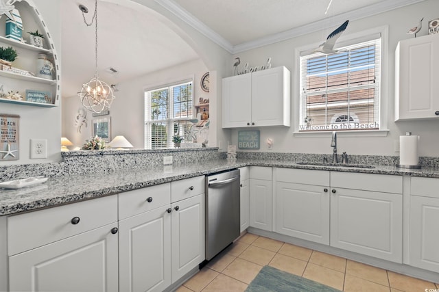 kitchen featuring white cabinetry, sink, ornamental molding, light tile patterned floors, and light stone countertops