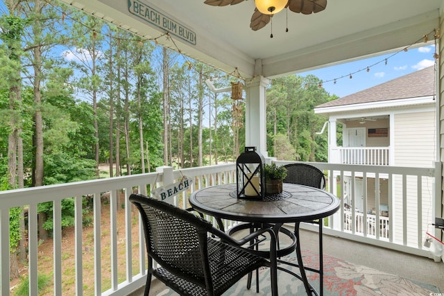 balcony featuring ceiling fan