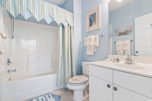 full bathroom featuring tile patterned flooring, shower / bath combo, vanity, and toilet