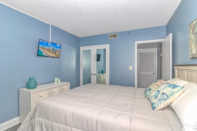 bedroom featuring a textured ceiling