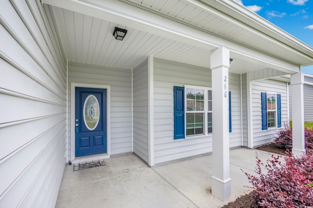 entrance to property with a porch