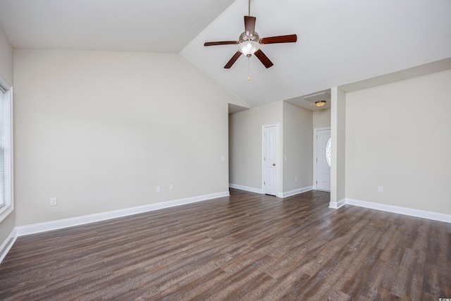 unfurnished room with lofted ceiling, dark hardwood / wood-style floors, and ceiling fan