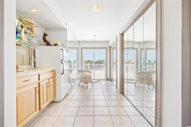 bathroom featuring tile patterned floors and vanity