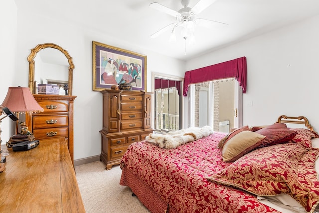 bedroom featuring ceiling fan and light colored carpet