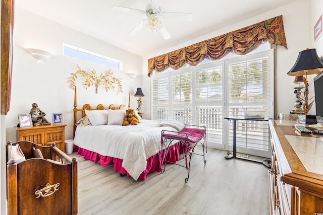 bedroom with ceiling fan and light hardwood / wood-style floors