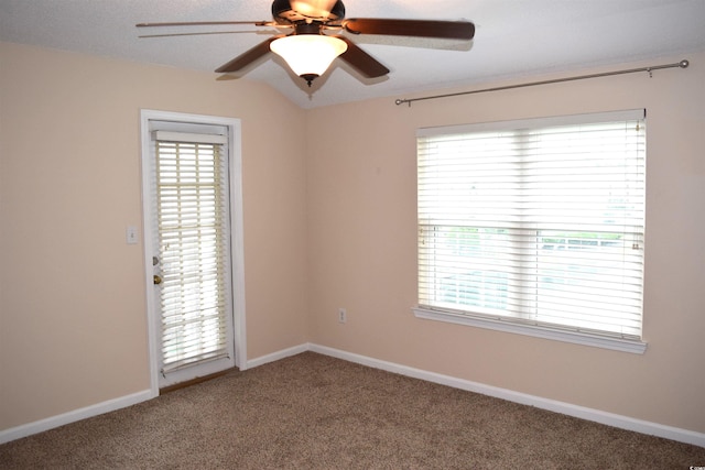 unfurnished room featuring ceiling fan, carpet floors, and lofted ceiling