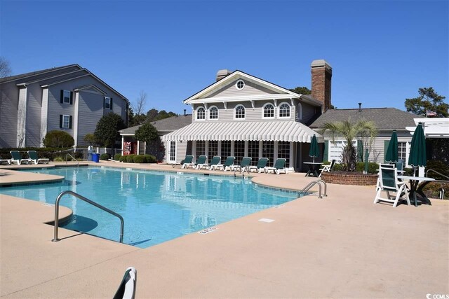 view of pool with a patio area