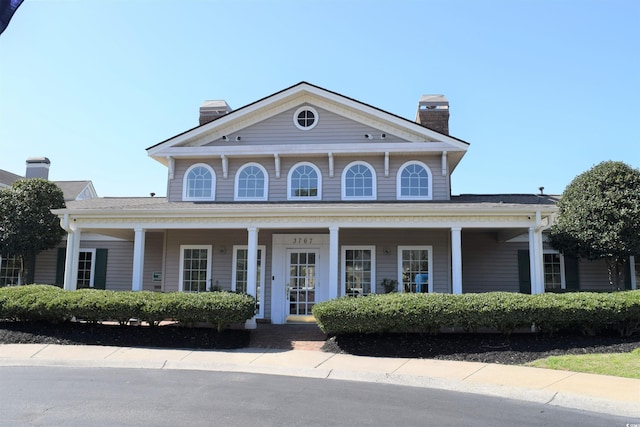 view of front of property featuring covered porch