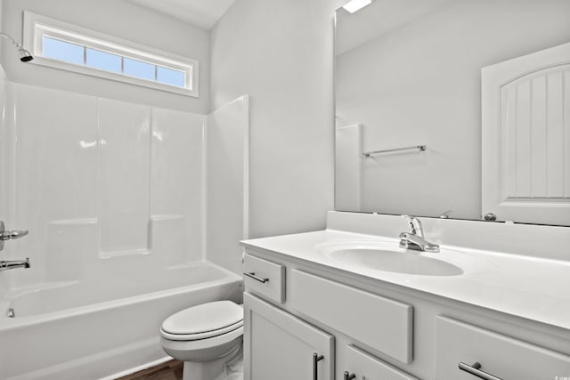 full bathroom featuring toilet, shower / bathtub combination, and vanity