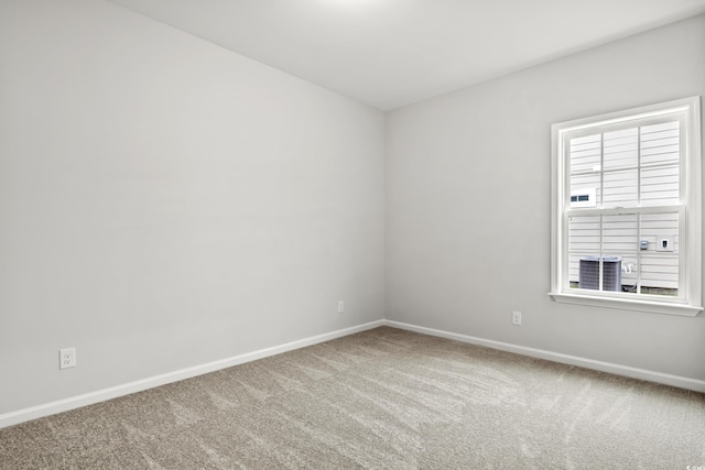 unfurnished room featuring carpet flooring