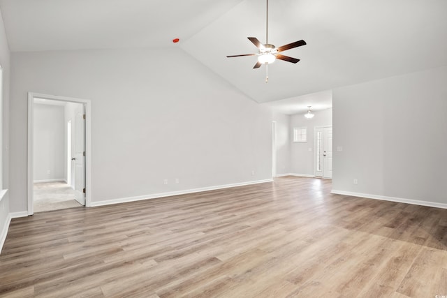 unfurnished living room featuring ceiling fan, light hardwood / wood-style flooring, and high vaulted ceiling