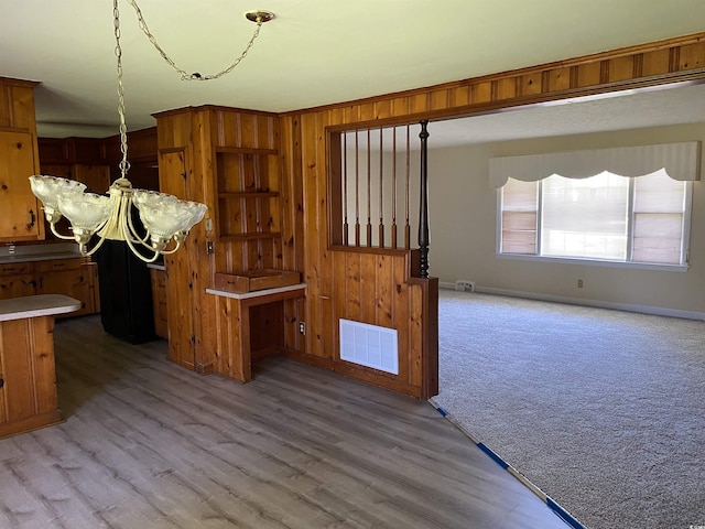 4155 Pinewood Dr, Mullins, SC 29574 - dining space with light hardwood / wood-style floors and a chandelier