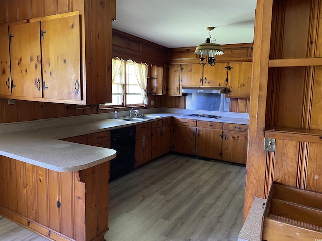 4155 Pinewood Dr, Mullins, SC 29574 - kitchen with dishwasher, kitchen peninsula, hanging light fixtures, and light hardwood / wood-style floors