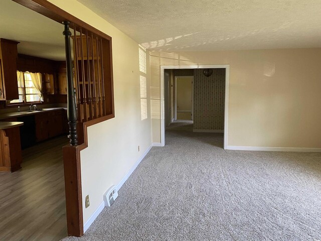 4155 Pinewood Dr, Mullins, SC 29574 - carpeted empty room with a textured ceiling