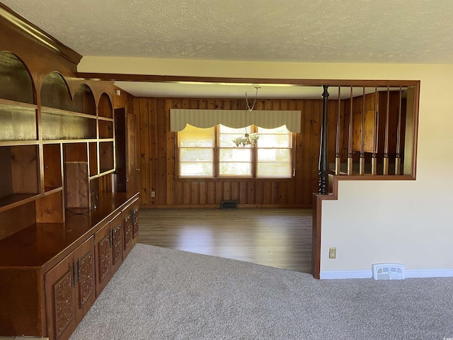 4155 Pinewood Dr, Mullins, SC 29574 - unfurnished living room featuring carpet flooring and a textured ceiling