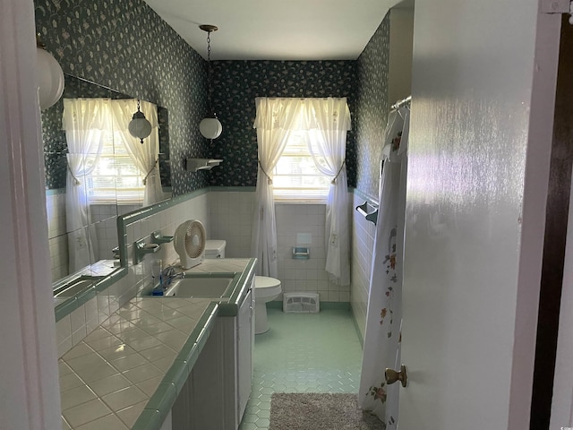 4155 Pinewood Dr, Mullins, SC 29574 - bathroom with tile patterned floors, vanity, and toilet